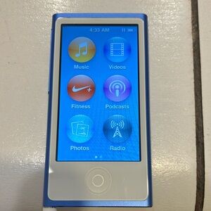 iPod touch. Blue. Works perfectly. Includes the headphones.